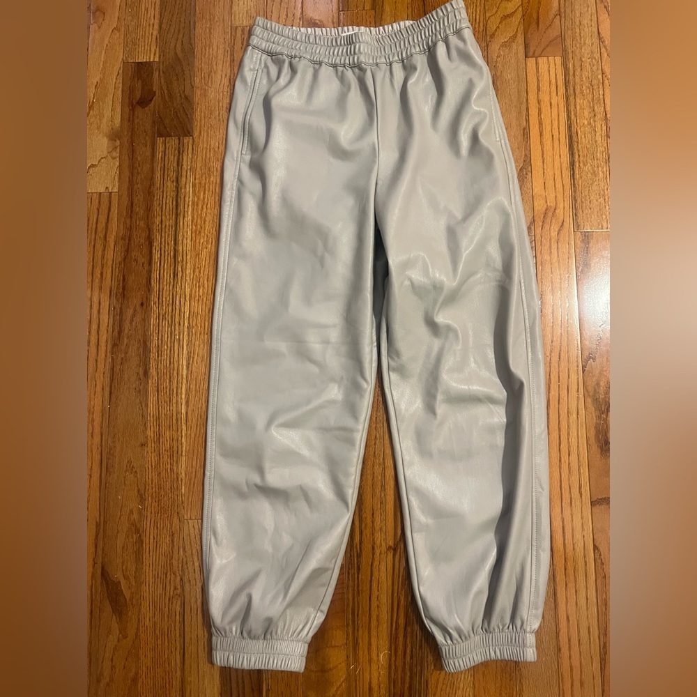 Taupe / cream leather joggers from Aritizia.